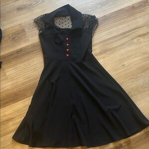 Black Dress with Sheer Polka Dot Yoke and Red Heart Buttons